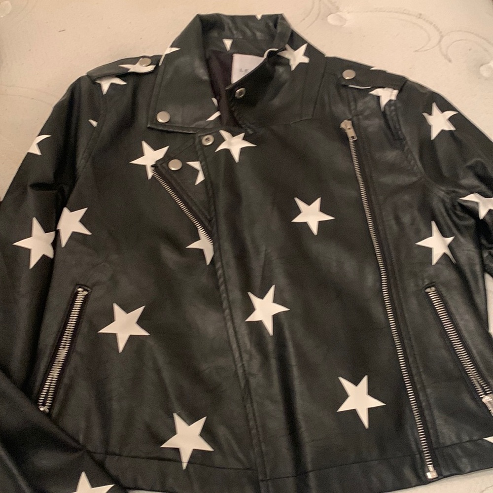 Black jacket with white stars. Perfect condition